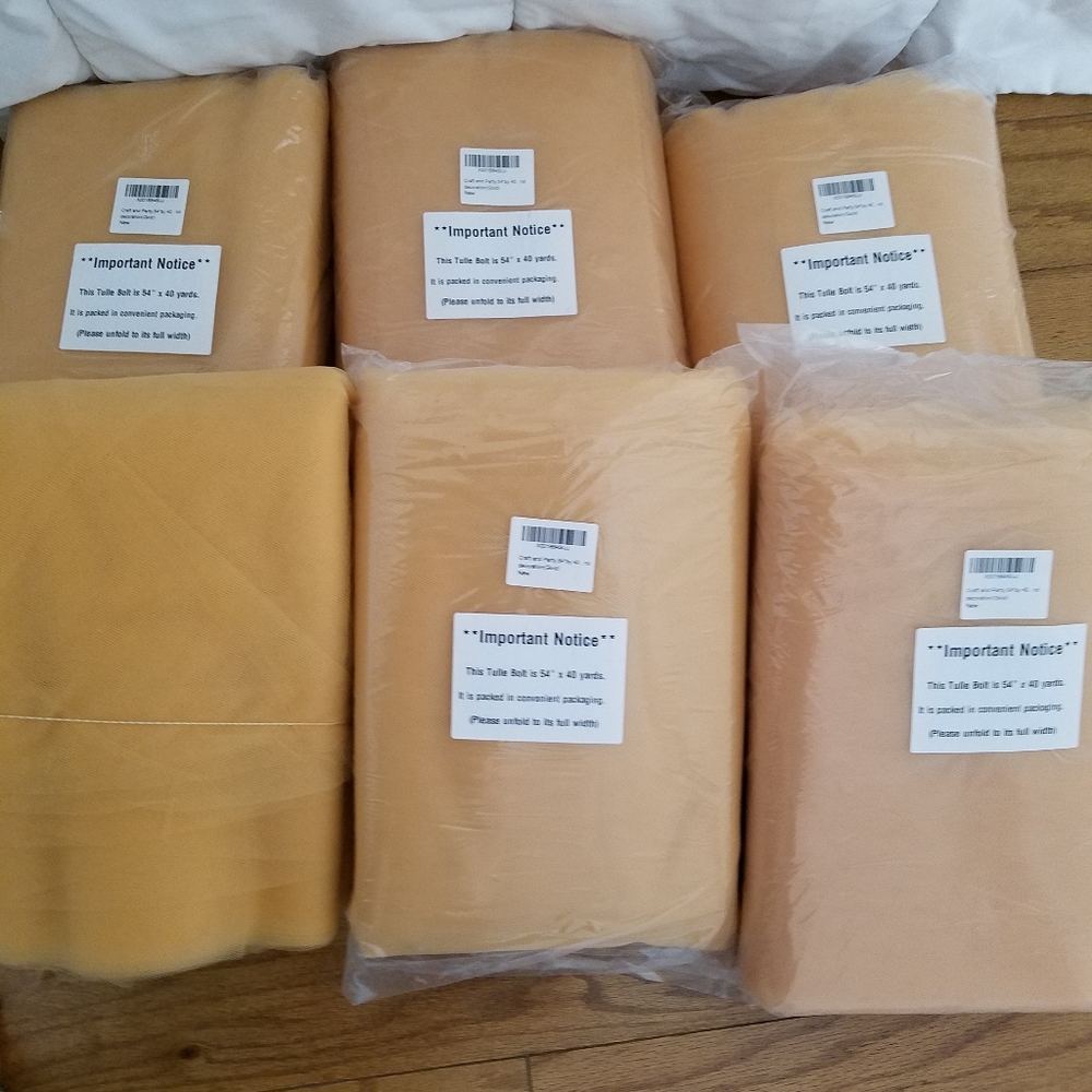 6 bolts of gold tulle.